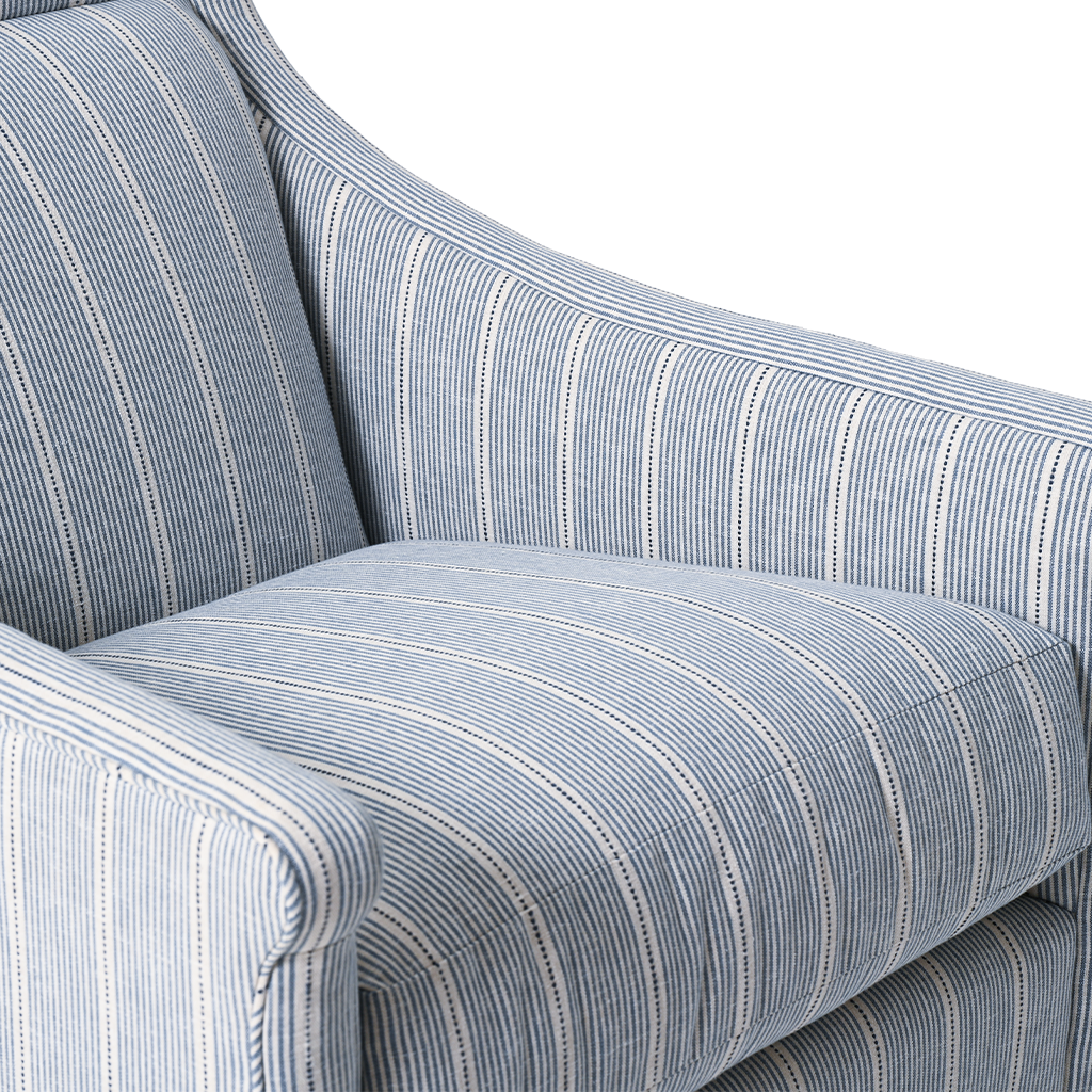 Close-up of a blue and white striped armchair
