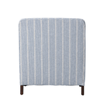 Striped armchair with wooden legs on a white background