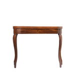 Front view of a closed wooden drop-leaf table with a warm wood finish, featuring delicate inlaid veneer detailing along the apron and slender, gracefully curved legs. Its compact, folded form showcases an elegant antique design.