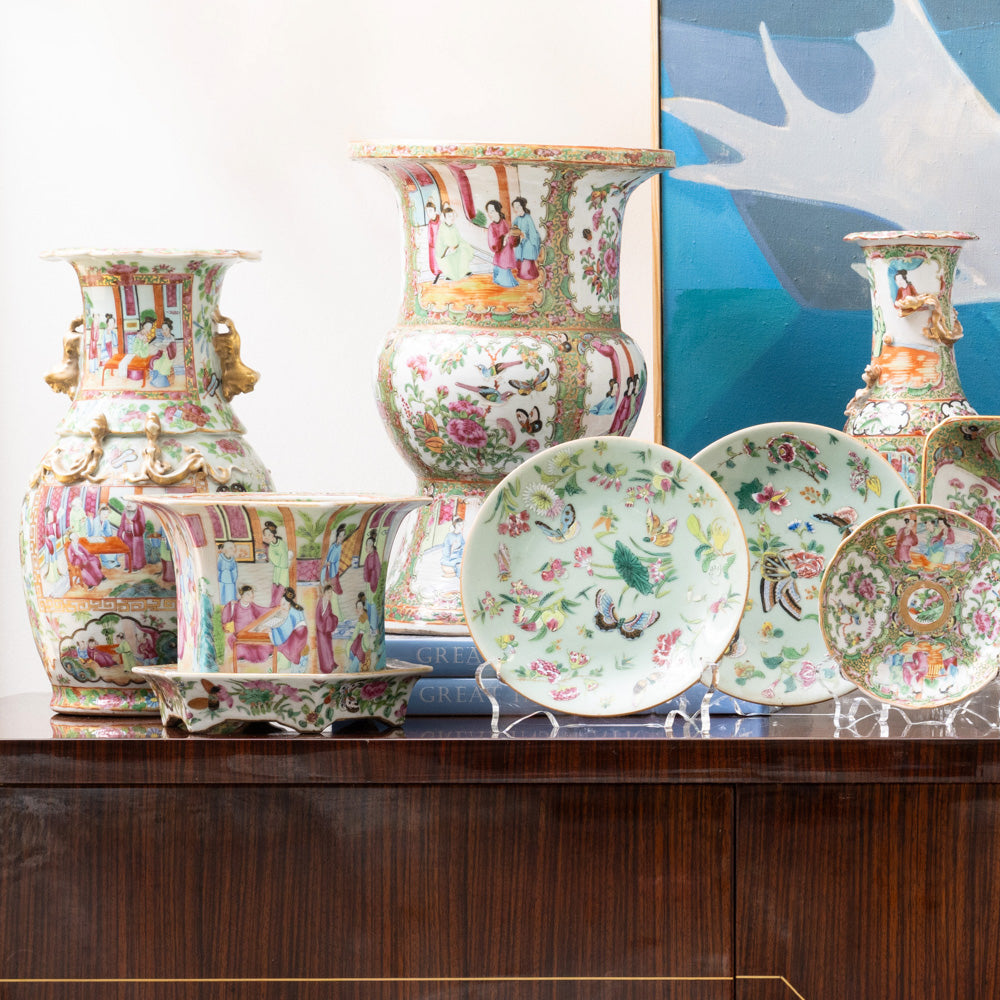 Set of Canton Famille Rose decorative porcelain vases and bowls with intricate floral and figurative patterns in pink,.