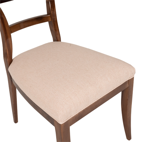 Walnut dining chair with pink subtle herringbone fabric and self-welt