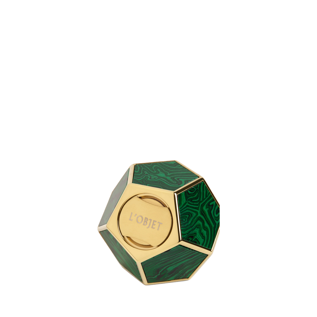 Hexagonal green and gold decorative item with 'L'Obieth' branding on a white background
