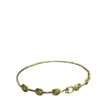 Gold bracelet with circular links and small diamonds on a white background