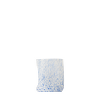 Drinking glass with blue and white pattern on a white background