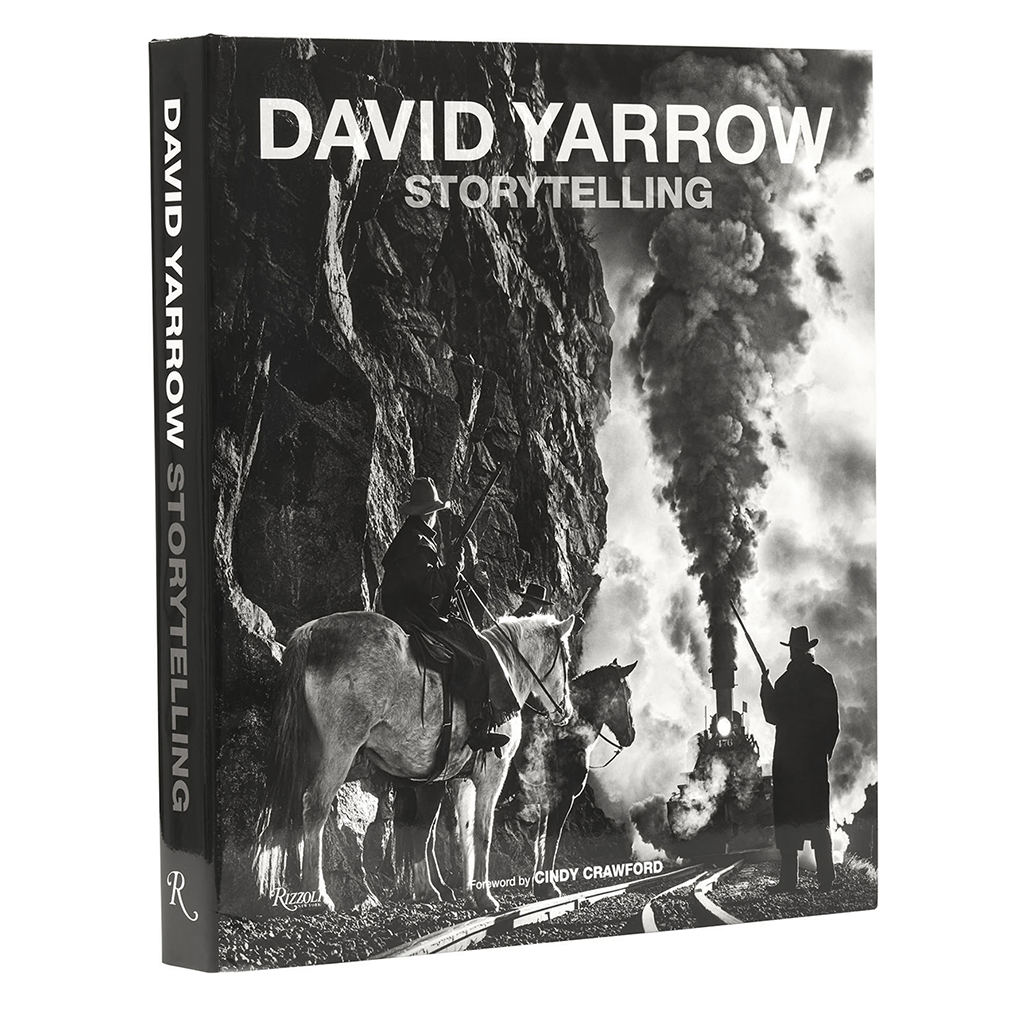 The book 'David Yarrow Storytelling' by David Yarrow and Choy Crawford, published by Routledge. The cover and spine feature a dramatic black and white historical photograph depicting a cowboy on a horse, a miner, and a steam locomotive.