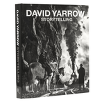 The book 'David Yarrow Storytelling' by David Yarrow and Choy Crawford, published by Routledge. The cover and spine feature a dramatic black and white historical photograph depicting a cowboy on a horse, a miner, and a steam locomotive.