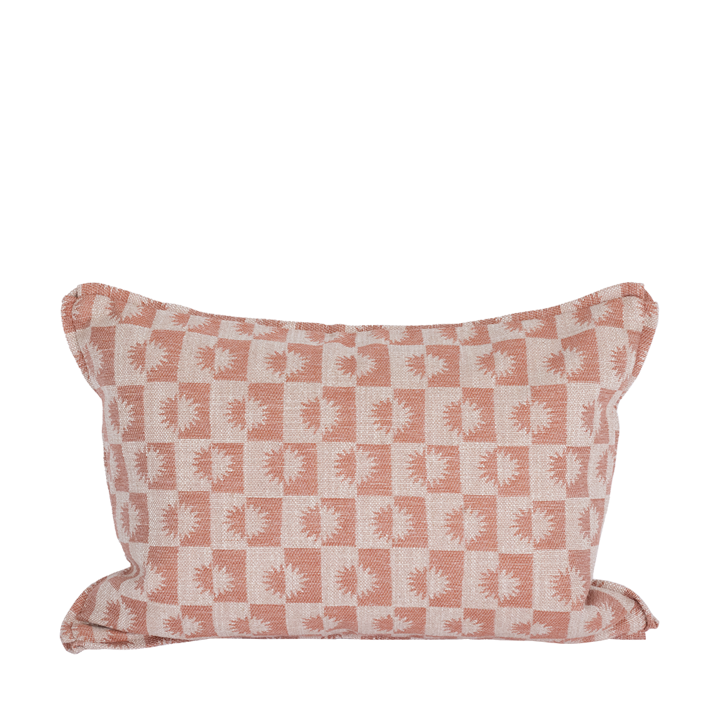 Lumbar pillow with pink sun design