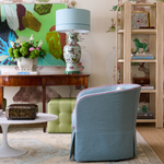 Bubblegum Blue and Bright Pink Swivel Chair in home