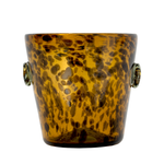 Tortoiseshell patterned glass ice bucket on a white background