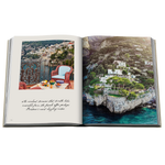 A photo of an open coffee table book with colorful Italian images on a white background