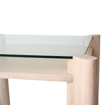 Wooden table with glass top on a white background