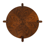 A small round walnut side table with a sunburst veneer design, featuring a glossy finish.