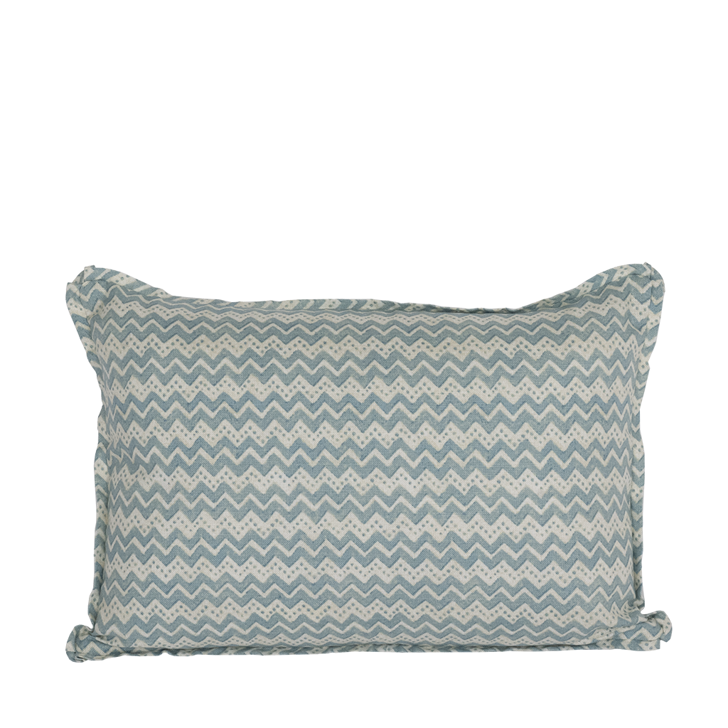 Rectangular lumbar pillow with a blue and white zigzag pattern and soft fabric cover.