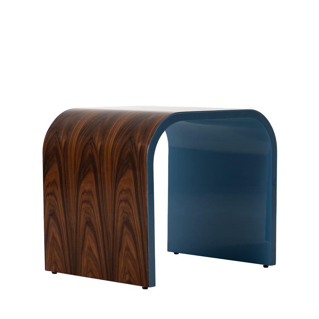 Two-toned stool with wooden pattern on one side and blue on the other on a white background