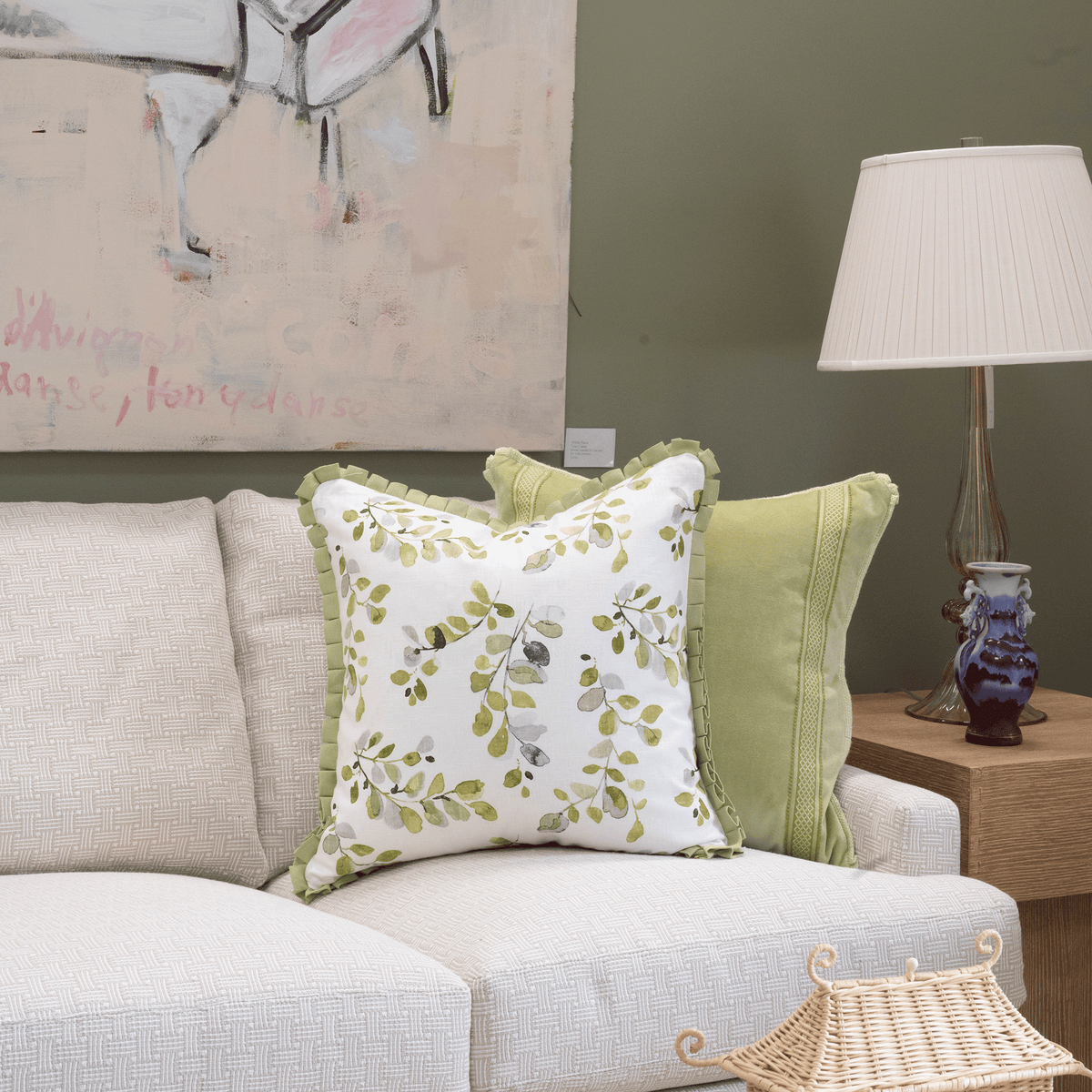 lifestyle image of flutter pillow with pistachio pillow