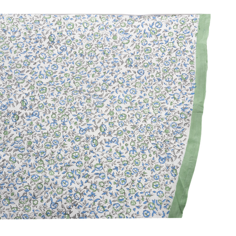 round versino of ivory tablecloth with blue and green floral pattern