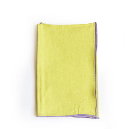 Folded view of Linen Colorblock Napkin in Tea Green with Lilac Trim