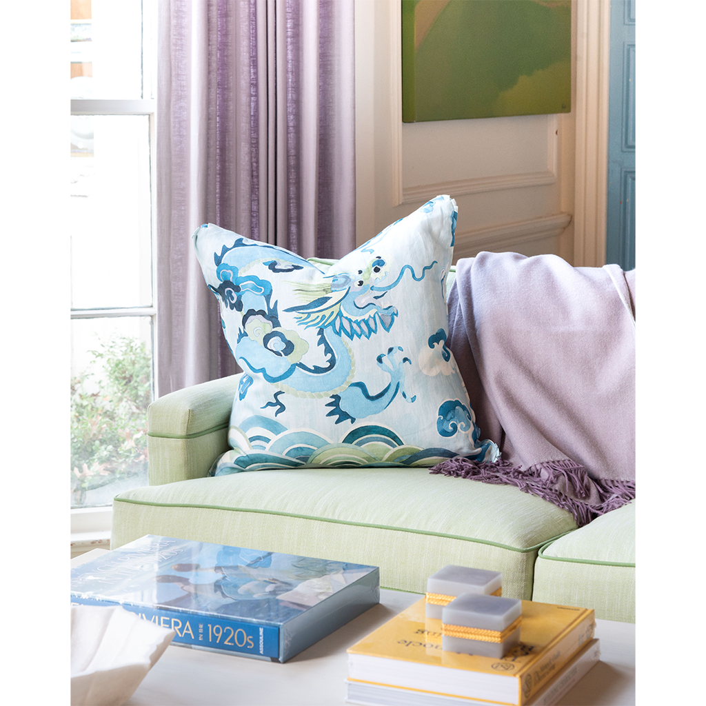 Blue Dragon Pillow on couch