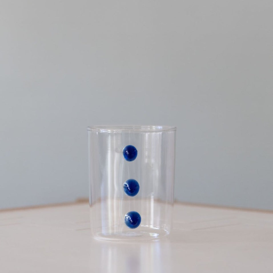 Three Tiered Blue Embellishment Tumbler on table