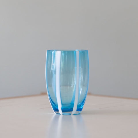 Aqua and White Striped Tumbler side view on tabletop