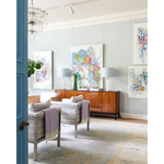 Lavender throw blanket draped over back of chair