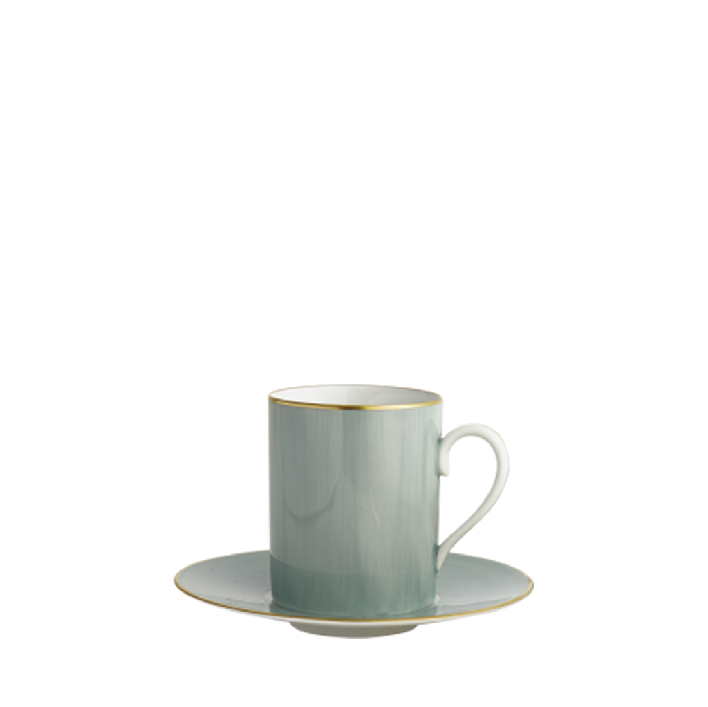 Celadon green tea cup with gold rim and matching saucer, smooth glossy finish.