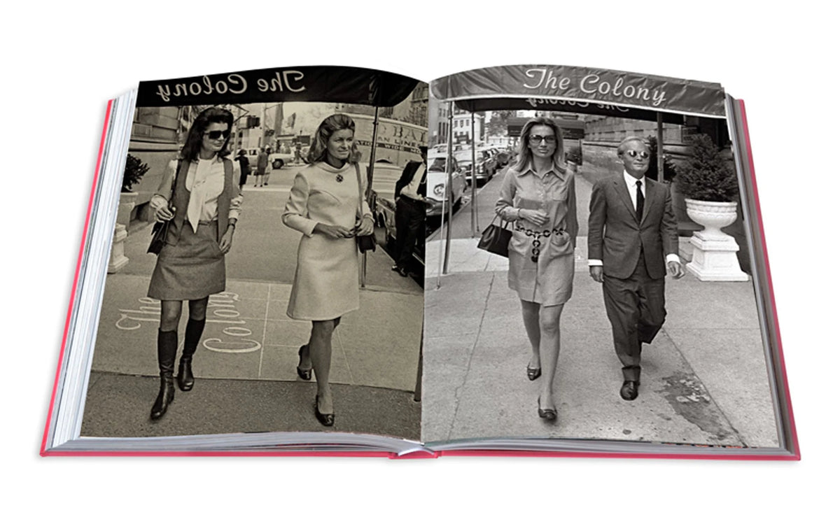 Swans: Legends of Jet Society book open featuring images taken in front of The Colony