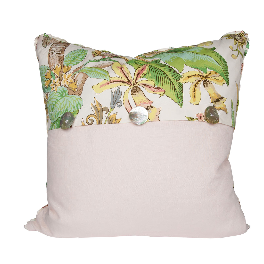 backside of pillow. Same print as front on top half and ivory/white linen on the bottom half