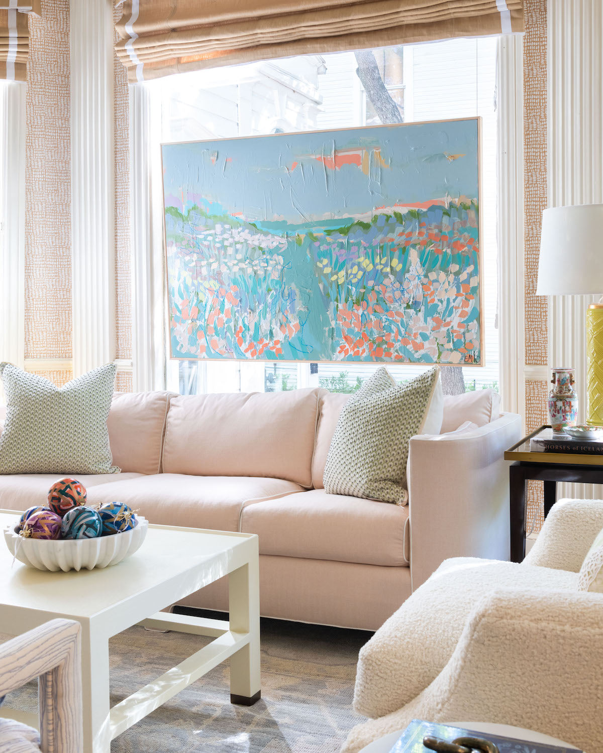Soho Sofa styled in room with art hanging above