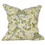 Green pillow with diamond design, green and yellow flower, green pagodas, and green and yellow people