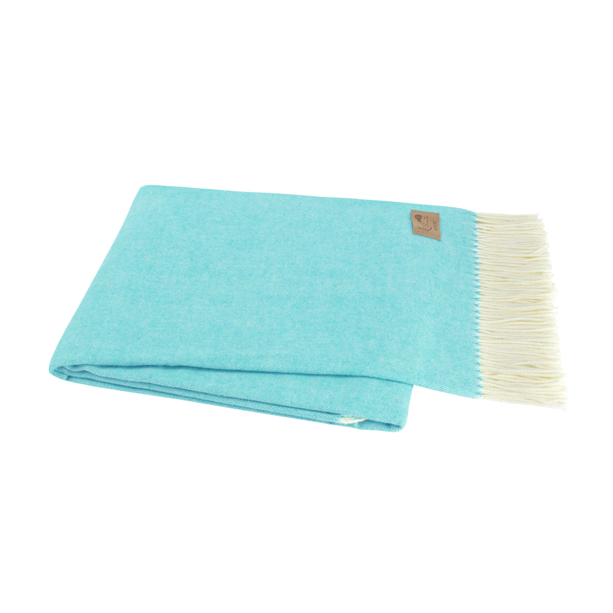 Turquoise blue folded throw blanket with fringe