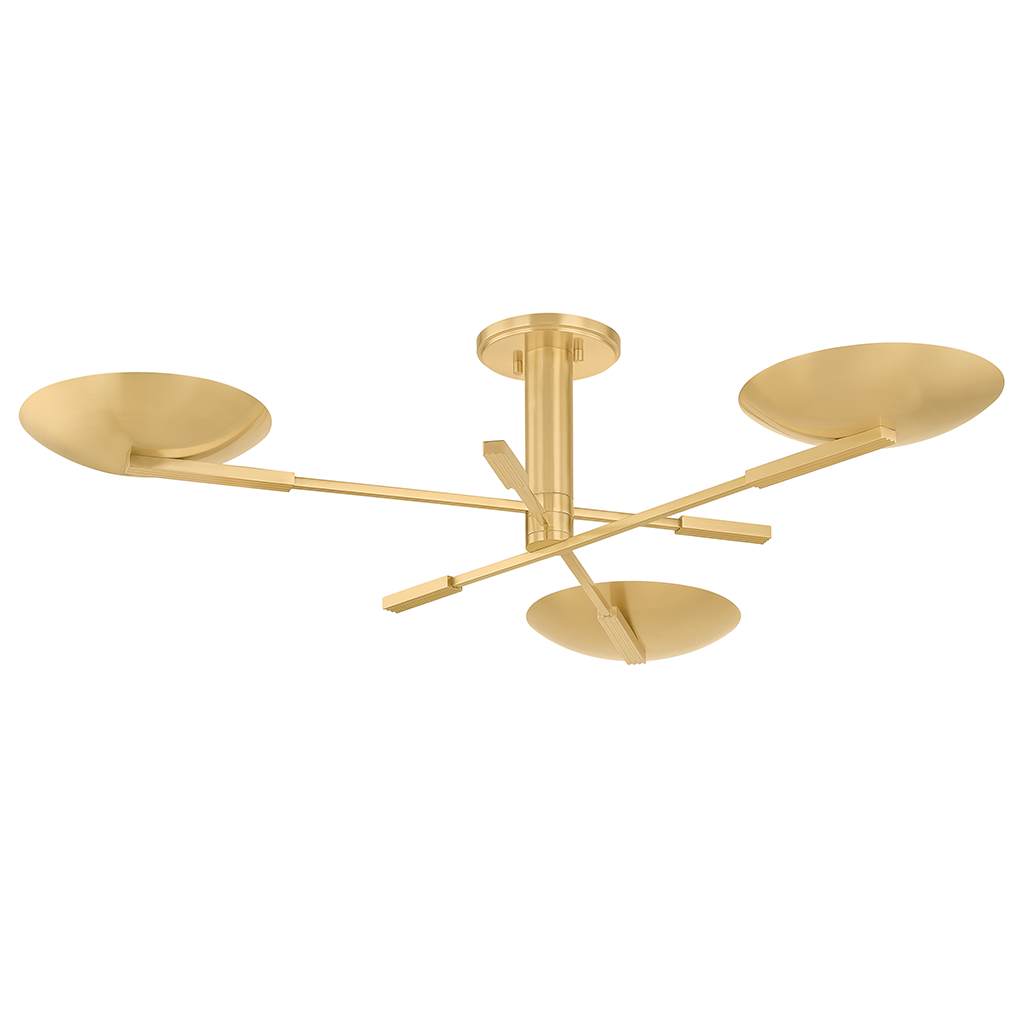 A modern three-light semi-flush mount ceiling fixture in a brushed gold finish, featuring three circular shades on angled arms against a solid white background.