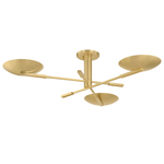 A modern three-light semi-flush mount ceiling fixture in a brushed gold finish, featuring three circular shades on angled arms against a solid white background.