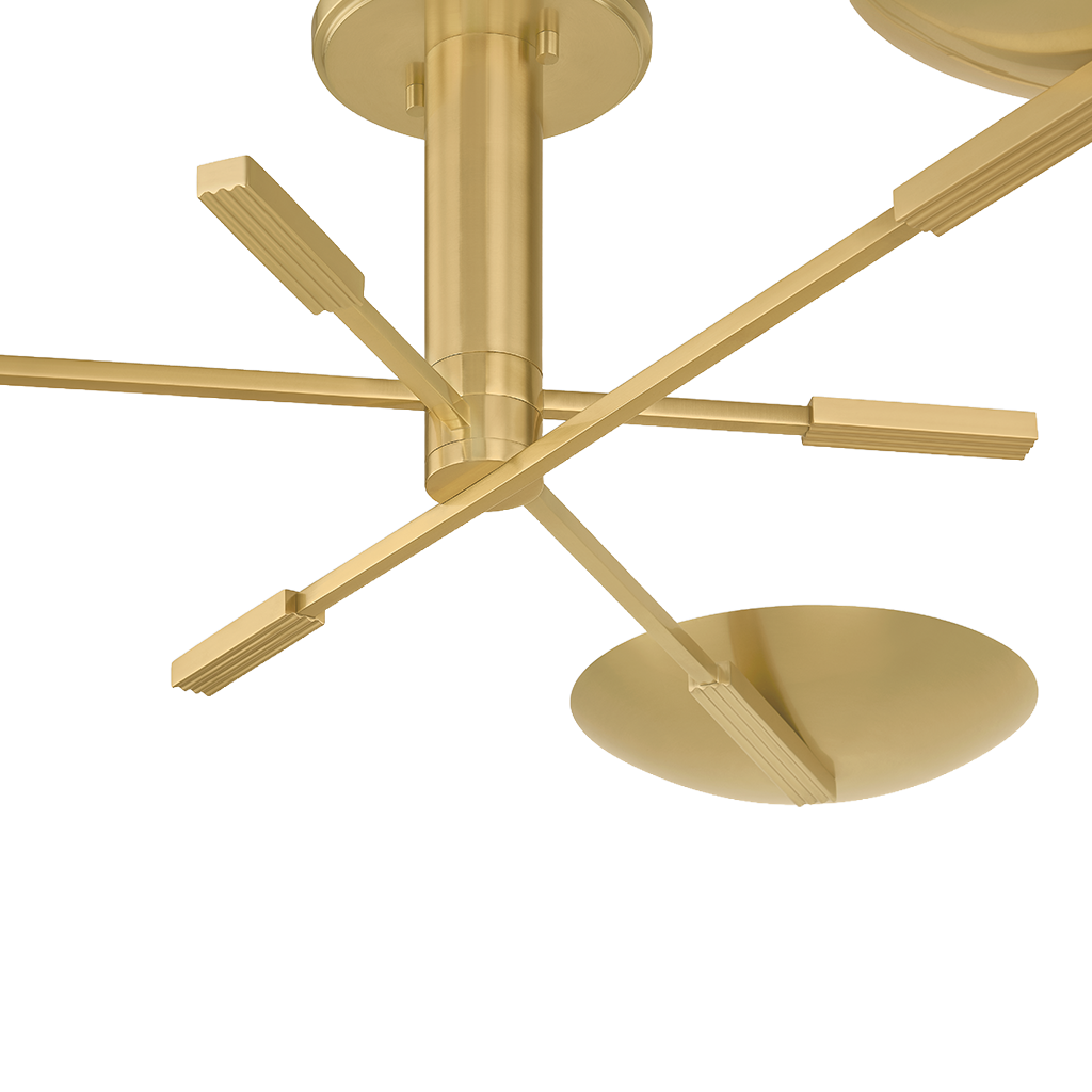 A modern ceiling pendant with a brushed gold finish, featuring geometric blade designs and a circular downlight, shown against a solid white background.