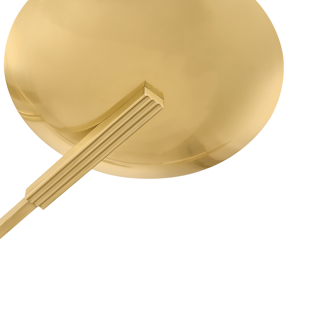 A close-up of a polished gold metal chandelier showing a large circular dome-like surface connected to a fluted cylindrical stem, isolated on a white background.