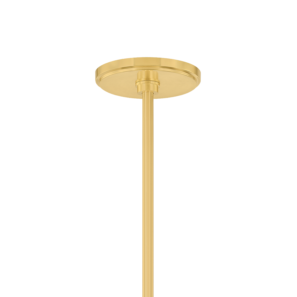 A close-up of a modern ceiling light fixture's circular canopy and downrod in a brushed gold finish, shown against a solid white background.