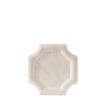 A small octagonal white marble tray with rounded corners and subtle gray veining, photographed on a seamless white background.