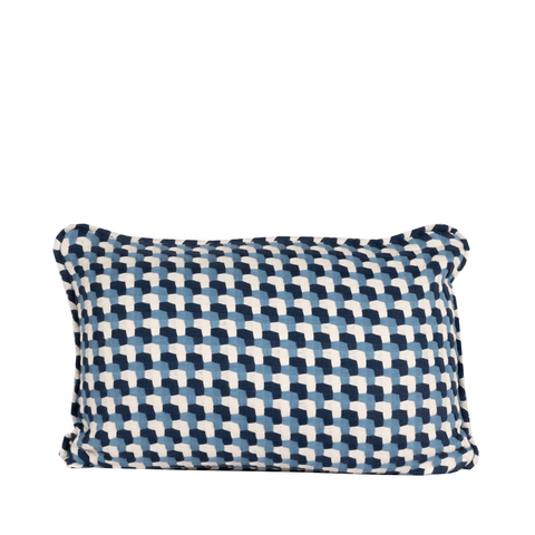 blue, white, and navy geometric pillow