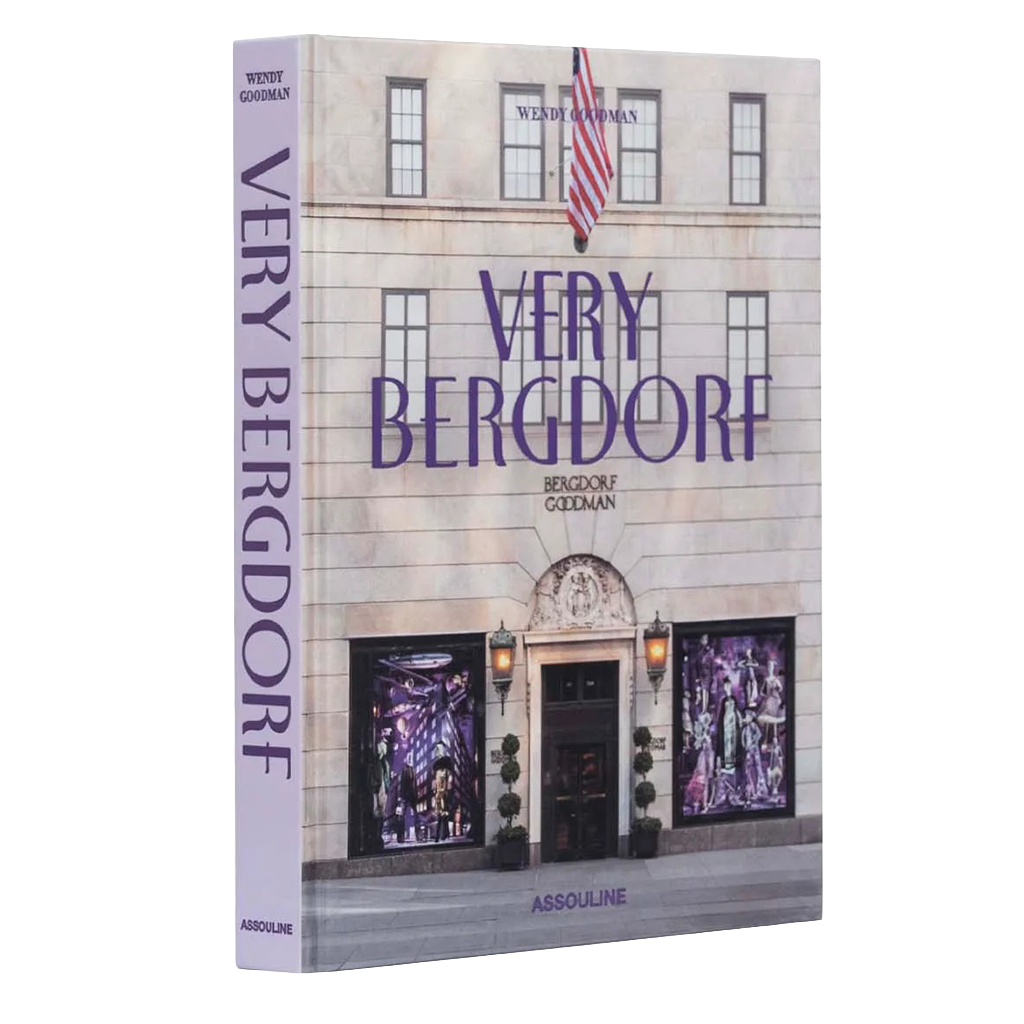 A hardcover book titled "Very Bergdorf" by Wendy Goodman and Beazold & Gellman, published by Assouline. The cover features a photograph of the elegant Bergdorf department store facade in New York City, with purple title text and purple window displays.