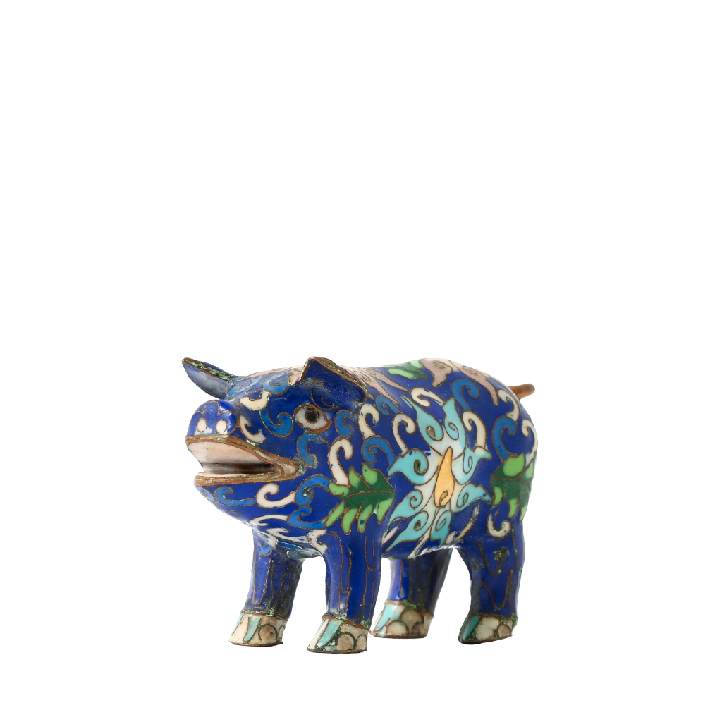 Decorative blue bull figurine with intricate patterns on a white background