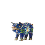 Decorative blue bull figurine with intricate patterns on a white background