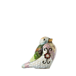 Decorative bird figurine with floral design on a white background