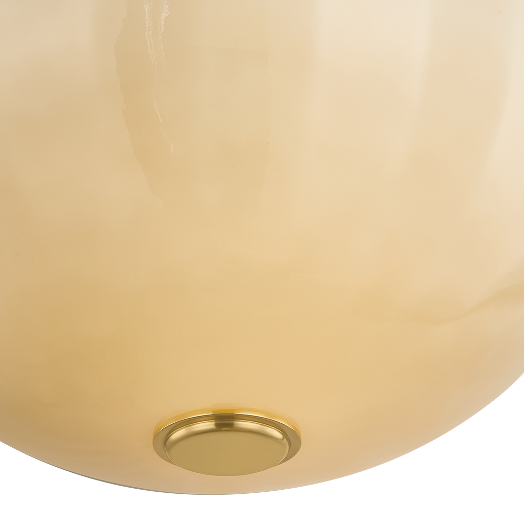 Close-up of a glossy cream-colored dome light fixture shade with a brushed gold metal mounting ring at the bottom, set against a plain white background.