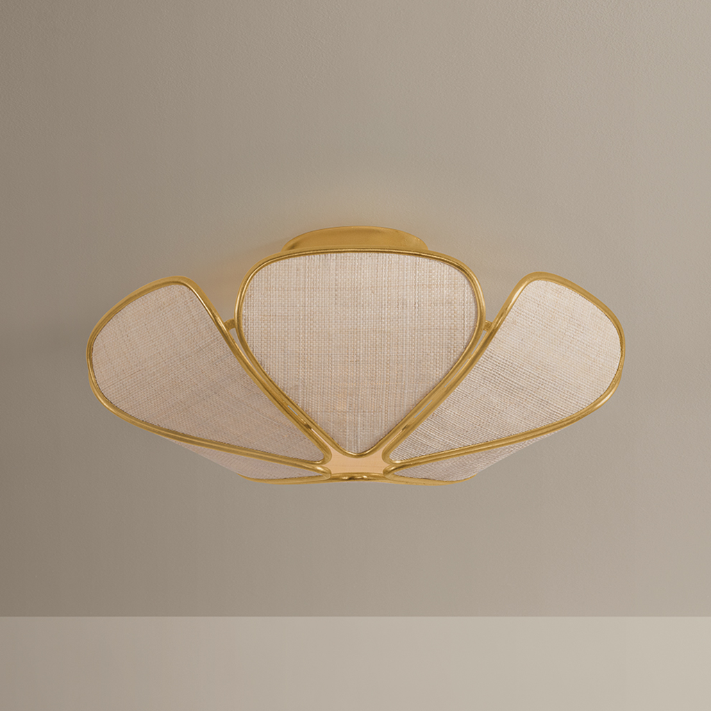 A modern semi-flush mount ceiling light fixture with a gold metal frame and textured beige fabric shades, shown against a neutral beige wall.