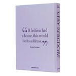 A hardcover book titled 'VERY BERGDORF' by Bergdorf Goodman, shown at a three-quarter angle on a plain white background. The cover is a very pale lavender-purple with dark purple text displaying a quote and the author's name.