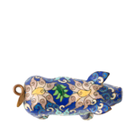 Decorative pig figurine with blue and gold patterns on a white background