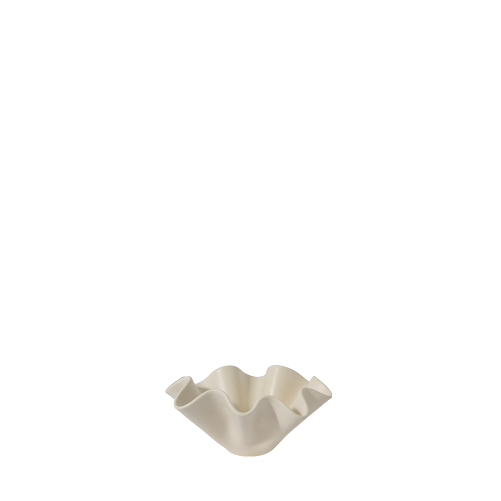 White ceramic bowl with wavy edge on a white background