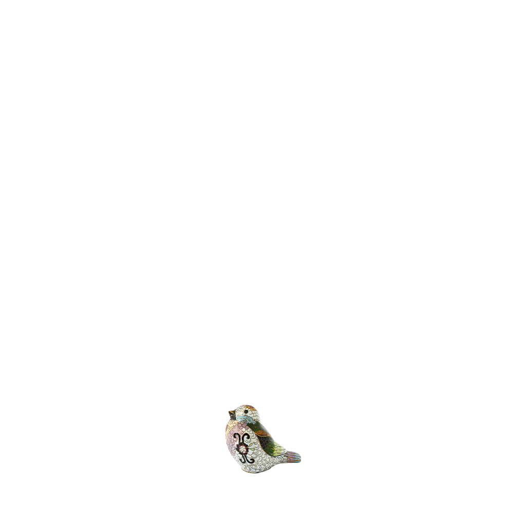 Small figurine of a stylized animal on a white background