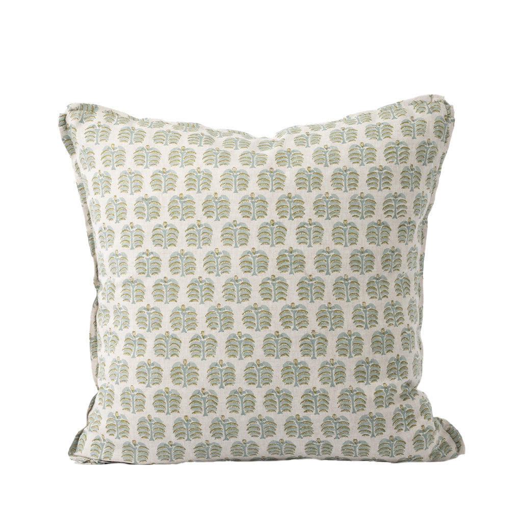 A square decorative throw pillow features an ivory fabric with a repeating botanical motif in muted sage green and golden tan. The subtle block-printed style and soft color palette create a timeless, elegant look.