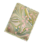 Marbled tray with pink and green design on a white background